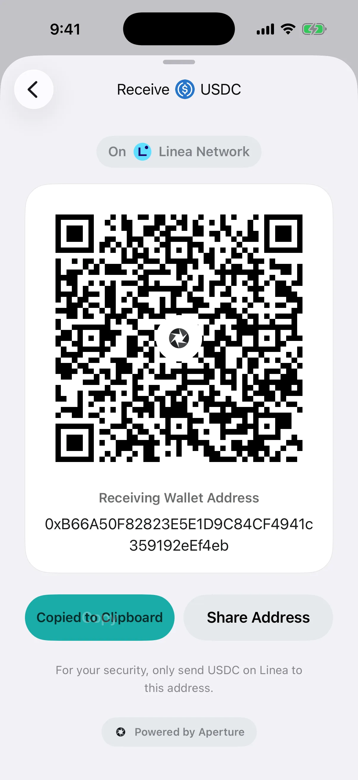 Real Oath USDC receive card in the iOS Simulator confirming the address was copied to the clipboard